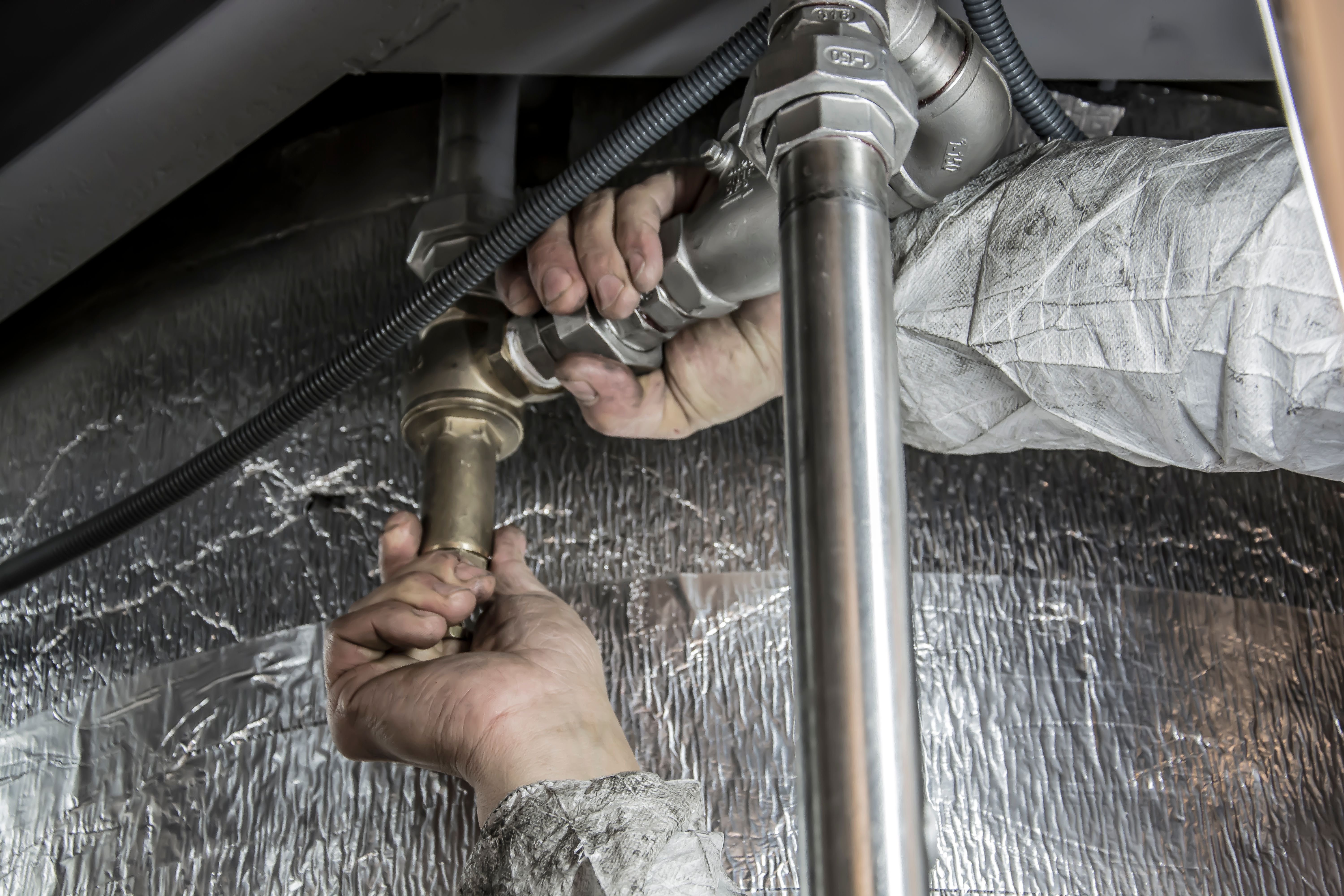 Plumber at work